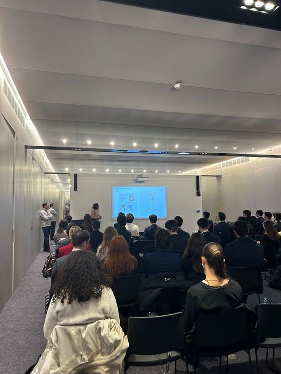 Students exploring finance careers at Aridan's office
